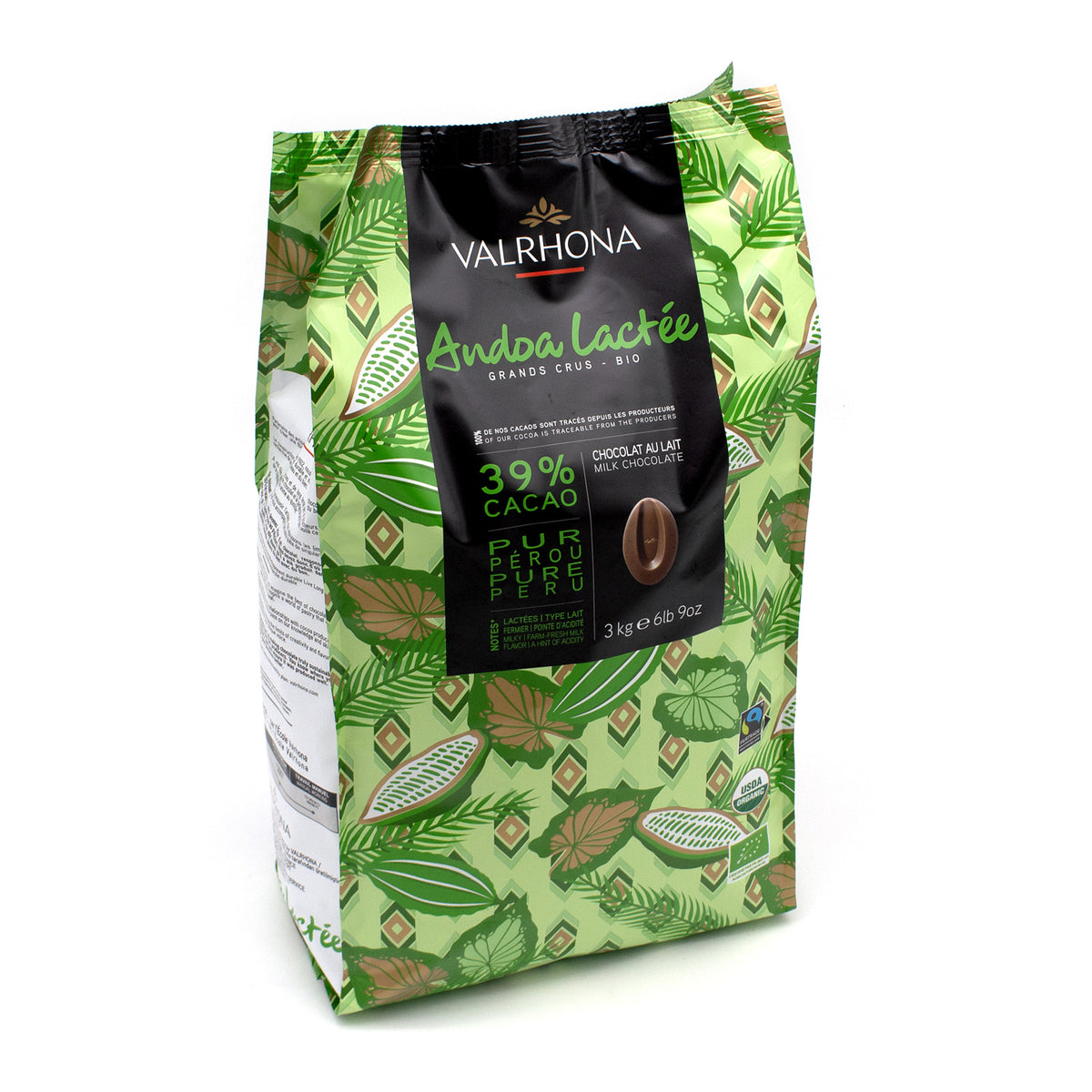 A 3 kg bag of Valrhona Andoa Lactée 39% Cacao chocolate, featuring a green and brown botanical leaf pattern with a central black label.
