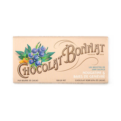 Chocolat Bonnat chocolate bar packaging with nougatine and juniper berries on a white background