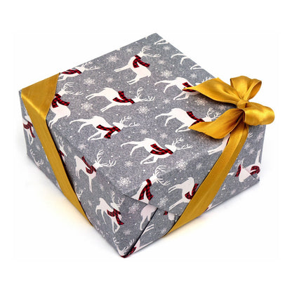 Gift box with reindeer pattern and gold ribbon