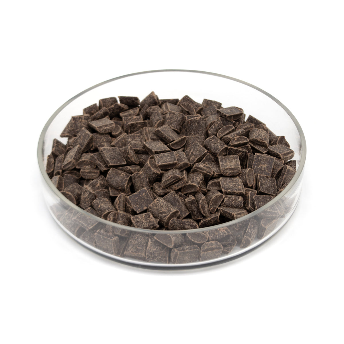 Dark chocolate chunks in a clear glass bowl on a white background.