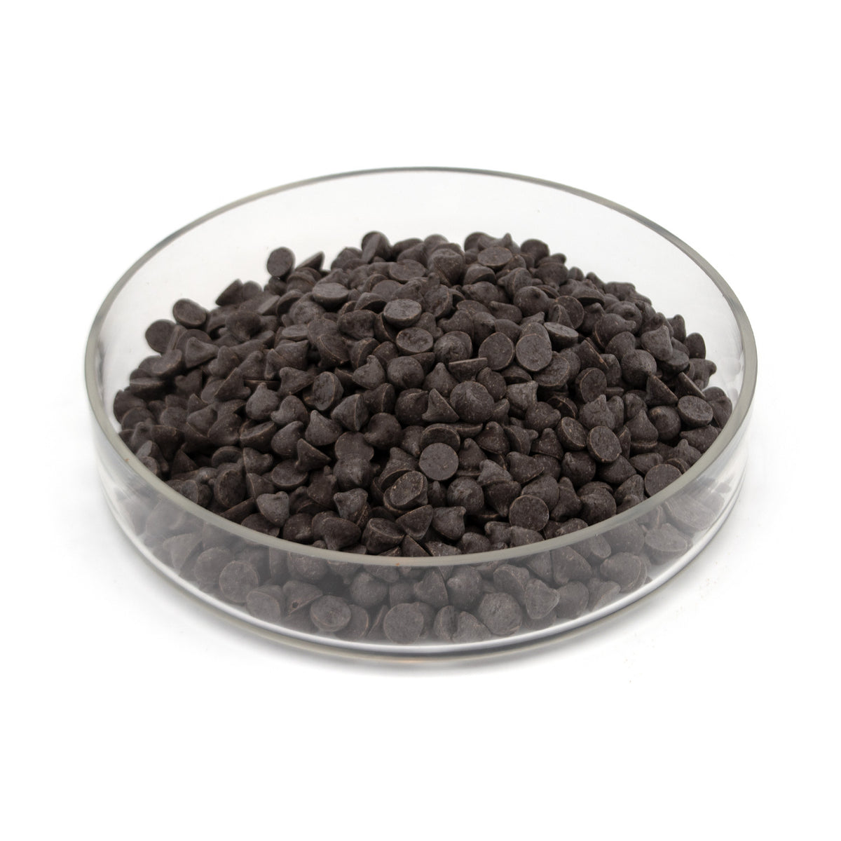 Glass bowl filled with dark chocolate chips on a white background
