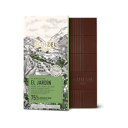 Cluizel chocolate bar with packaging featuring a scenic illustration.