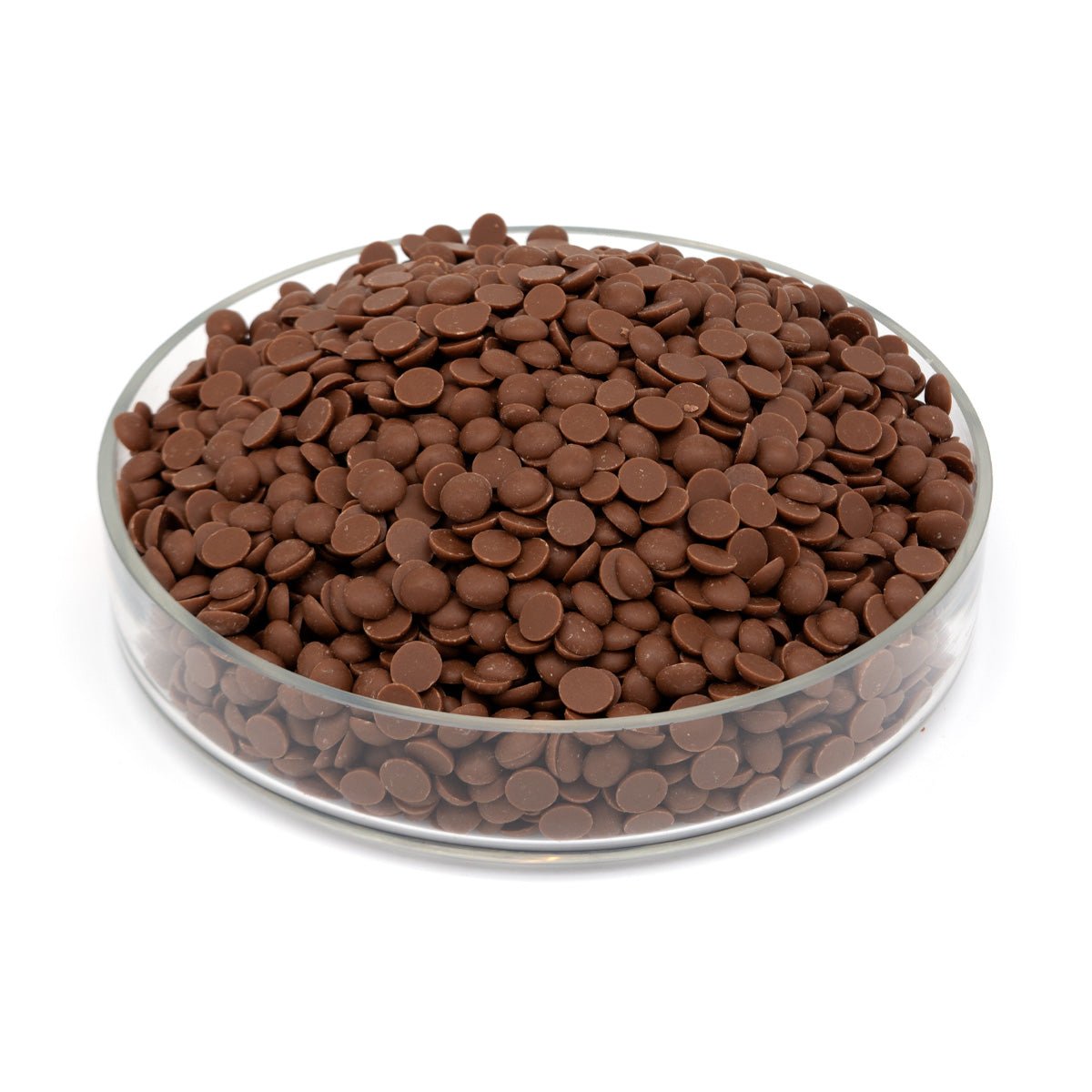 Glass bowl filled with chocolate chips on a white background