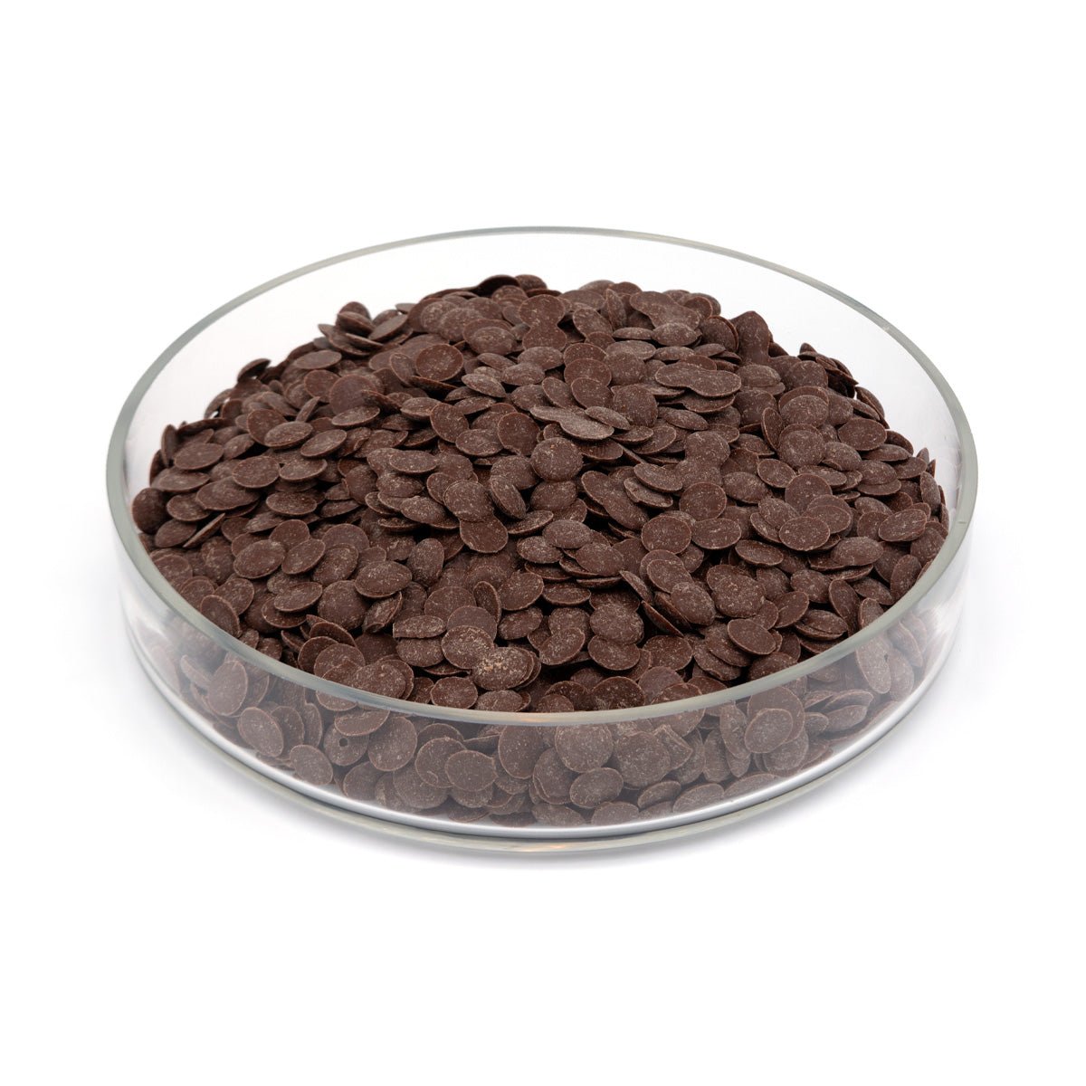 Glass bowl filled with chocolate chips on a white background