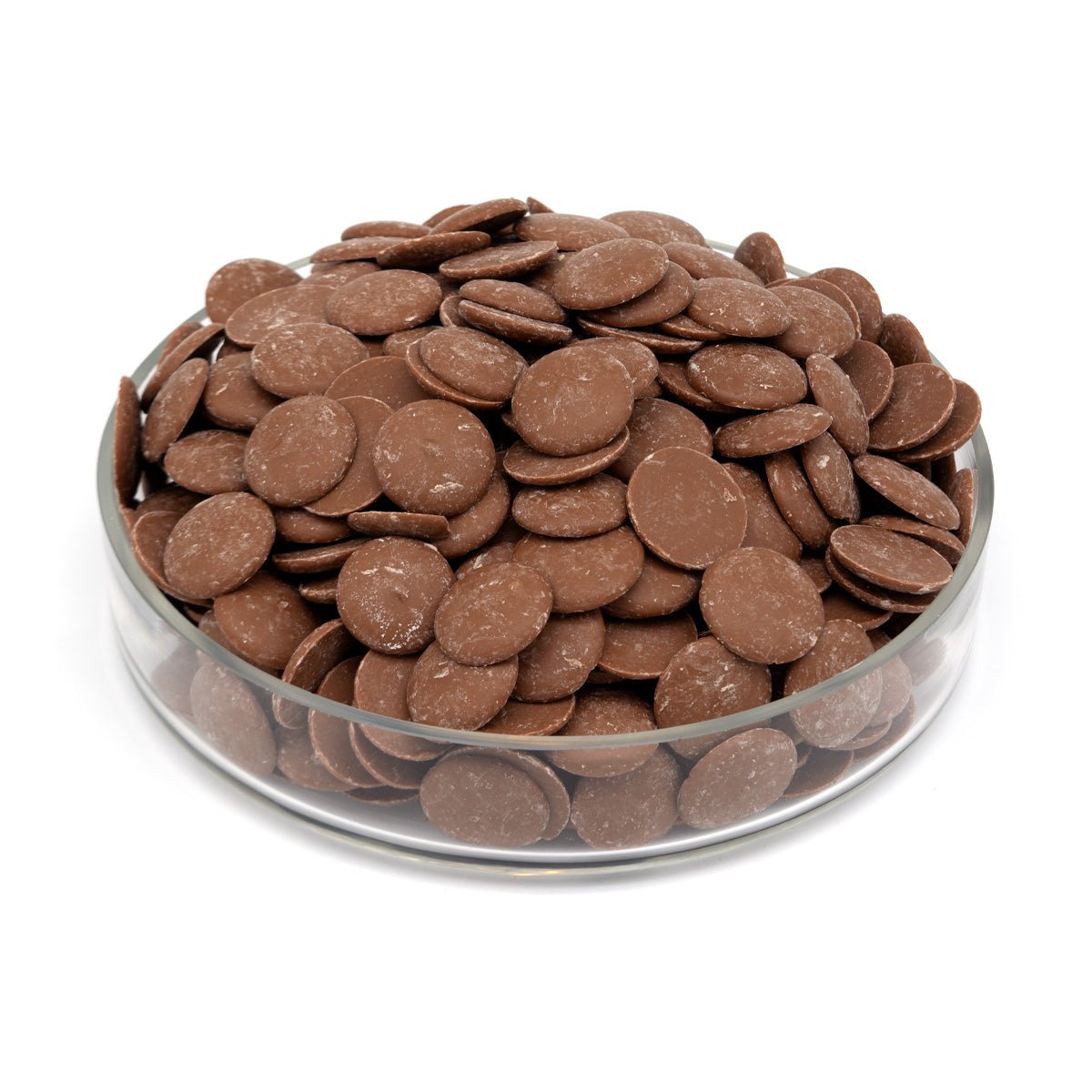 Glass bowl filled with chocolate chips on a white background