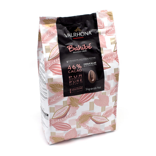A 3 kg bag of Valrhona Bahibé chocolate, featuring a white bag decorated with pink cocoa pod illustrations and a central black label.