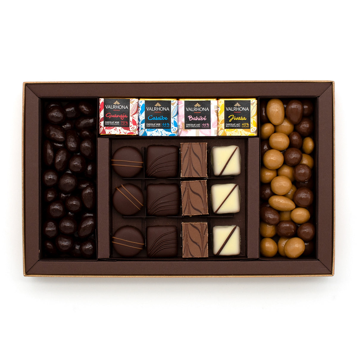 Valrhona assorted chocolate box with chocolate coated nuts and truffles on a white background