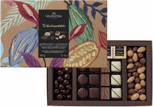 Valrhona chocolate assortment with a decorative box featuring leaves.