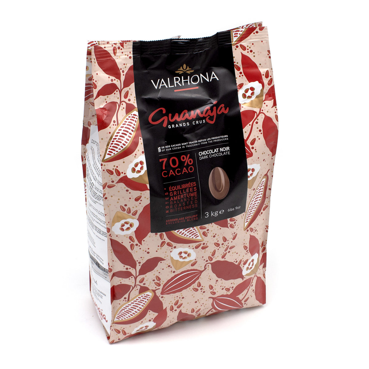 A 3 kg bag of Valrhona Guanaja chocolate, featuring a beige and red botanical cocoa leaf pattern with a prominent black label on the front.