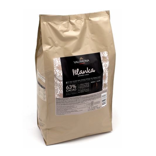 A 1kg bag of Valrhona Illanca 63% Cacao chocolate in a metallic gold pouch with a black and white label, photographed on a white background.