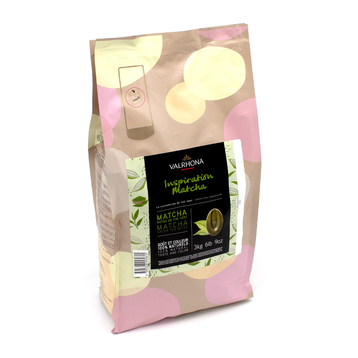 A 3 kg bag of Valrhona Inspiration Matcha green tea couverture, featuring a beige and pink patterned bag with a black and green label, set against a plain white background.