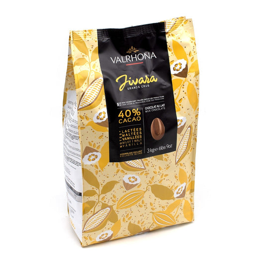 A 3 kg bag of Valrhona Jivara Grands Crus 40% cacao chocolate, featuring a yellow and white cocoa pod pattern with a central black label.